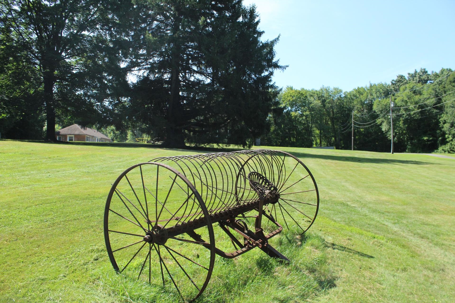 antique hay rake at the Altamont Property